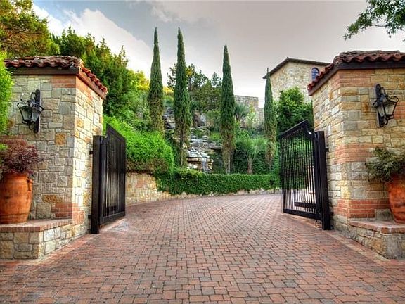 Gated entry with waterfall