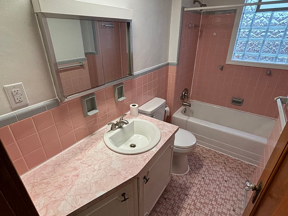 Large bathroom with new toilet, faucet, and bathtub/shower hardware