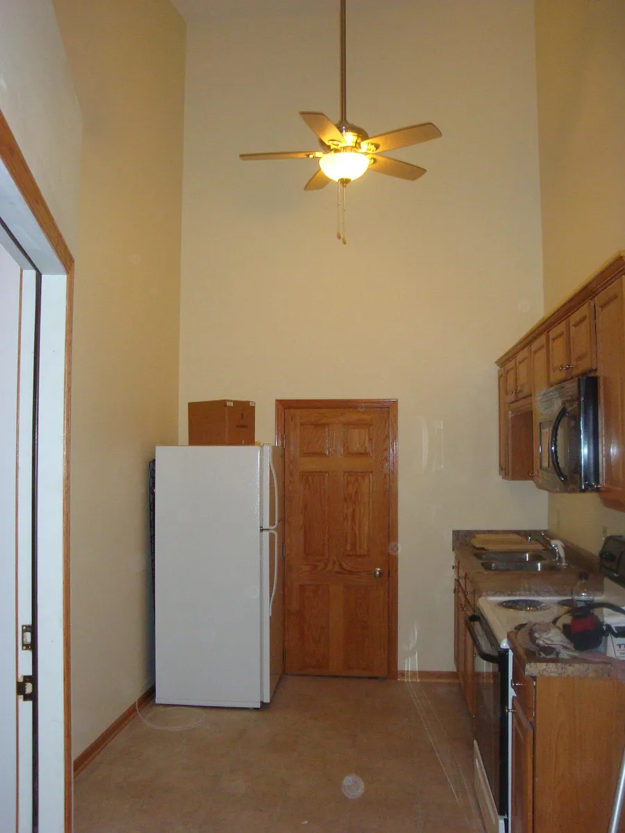 Kitchen door to storage area - 129 Main St #3