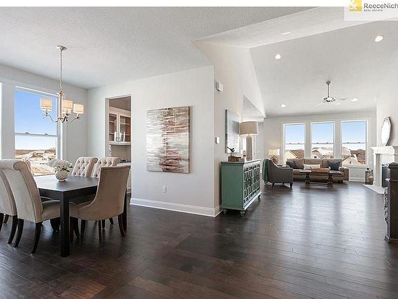 Wide open great room and stairs placed to the side leave plenty of space for living!