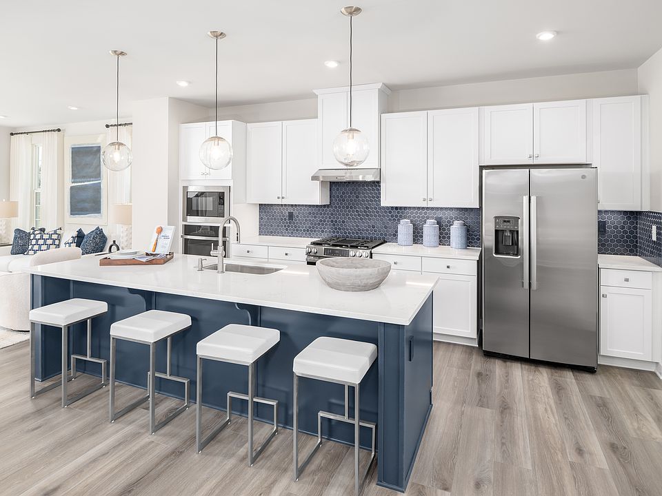 Luxury townhomes - Enjoy backyards, outdoor living, a clubhouse, and an unbeatable location