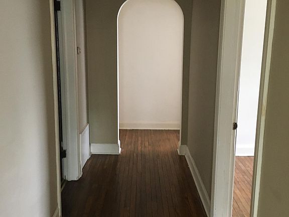 Hall towards living room, with beautiful wood floors