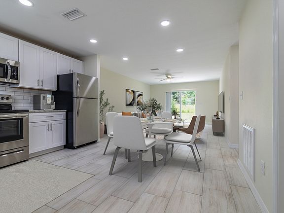 Porcelain tiles throughout. (Staged picture).