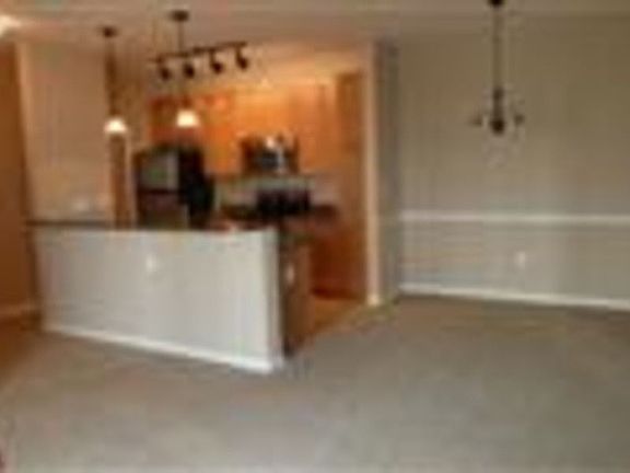 separate dining room with chair rail