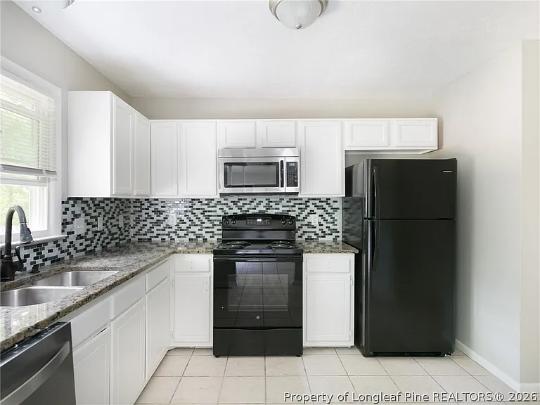 6714 Seaford Dr — Photo 10