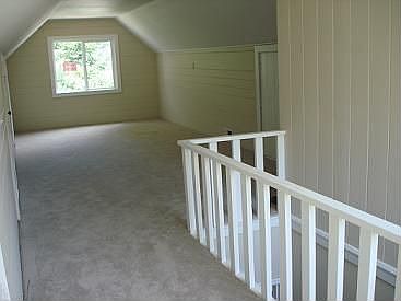 Huge loft for office/den.  Tons of extra storage.  New insulation