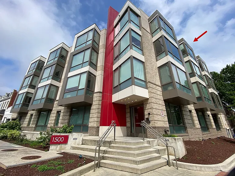 The exterior of the building with the unit's location highlighted