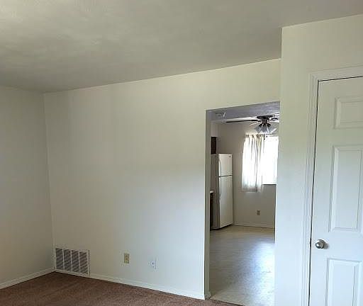 LARGE LIVING ROOM DOWNSTAIRS WITH COAT CLOSET