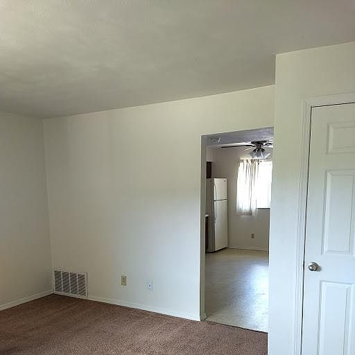 LARGE LIVING ROOM DOWNSTAIRS WITH COAT CLOSET