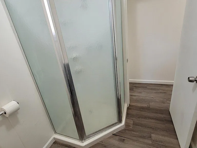 Bathroom - Corner shower unit.