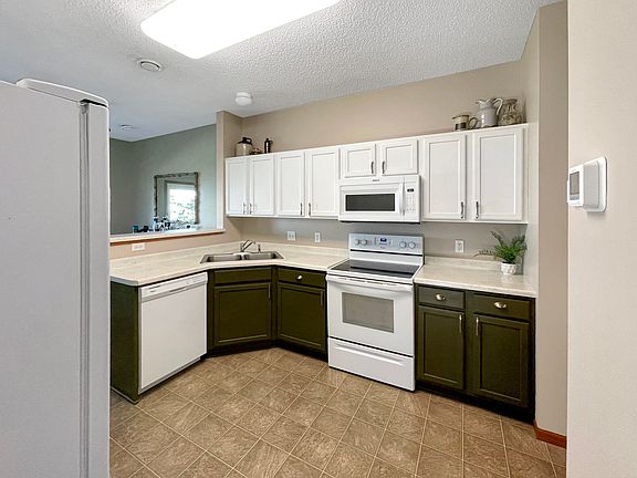 4th image of 6886 139th Ln NW Unit 4