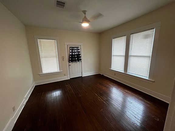 Front living room, looking toward entry door.