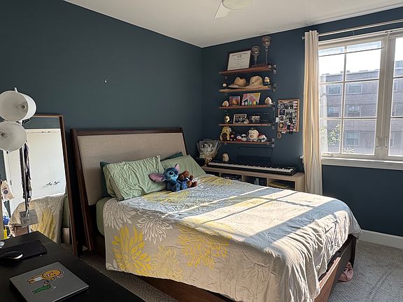 Master bedroom that is big enough to fit a queen bed and a work desk. UNFURNISHED.