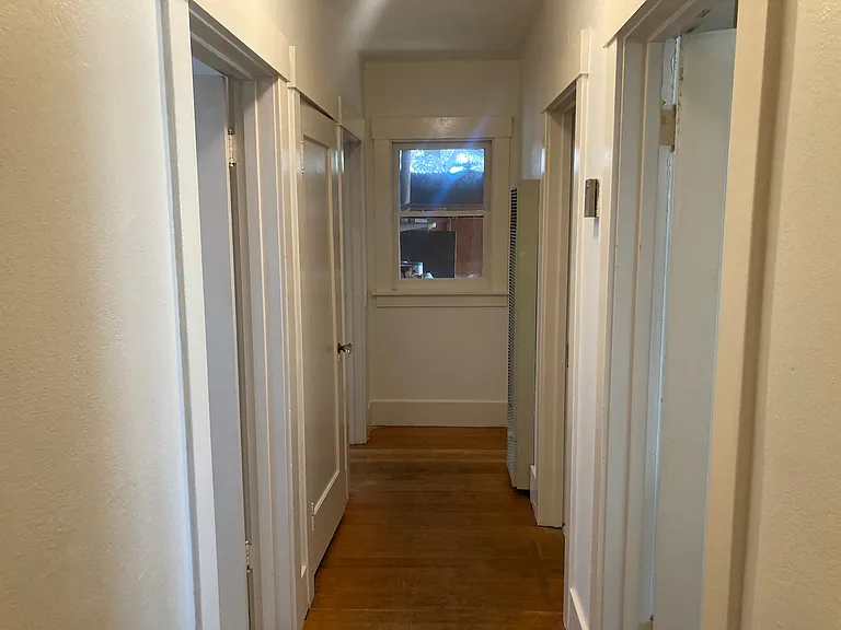 Hallway to bath and bedrooms
