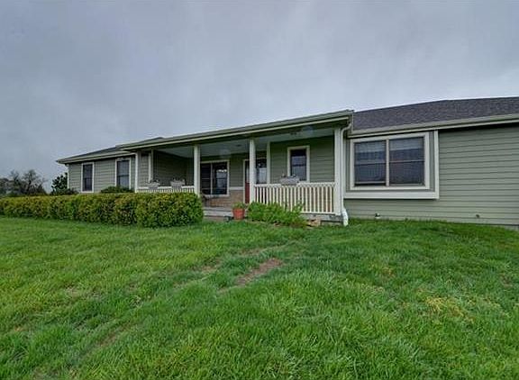 READY FOR MORNING COFFEE ON YOUR EAST SIDE FRONT PORCH