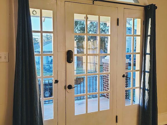 Interior view of front door and operational sidelights.