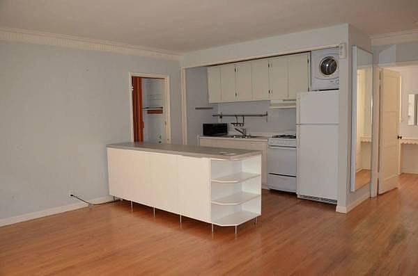 Living room plus compact kitchen