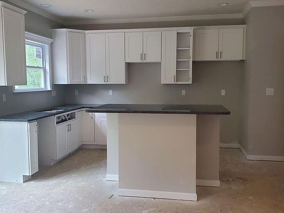 Kitchen with Granite Countertops and Island