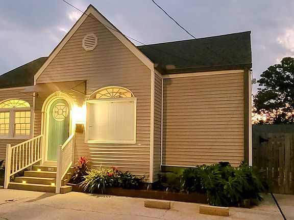 Front of home with off-street parking for 4 vehicles.
