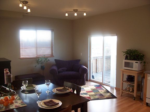 Relax the evening away in this family room with the same views.