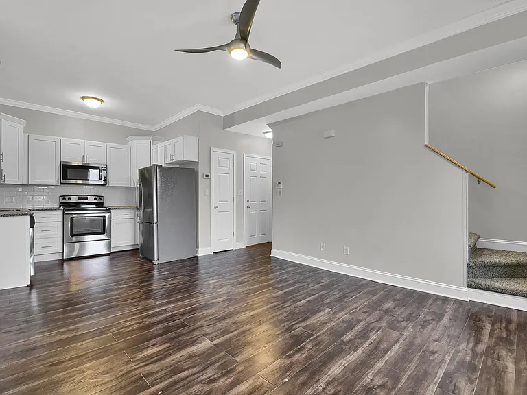 Kitchen & Family room - level 1: contemporary open floor plan, beautiful hardwood floors, crown moulding, with dual zoned heating and cooling