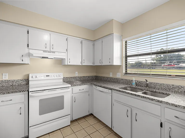 View of the kitchen and range