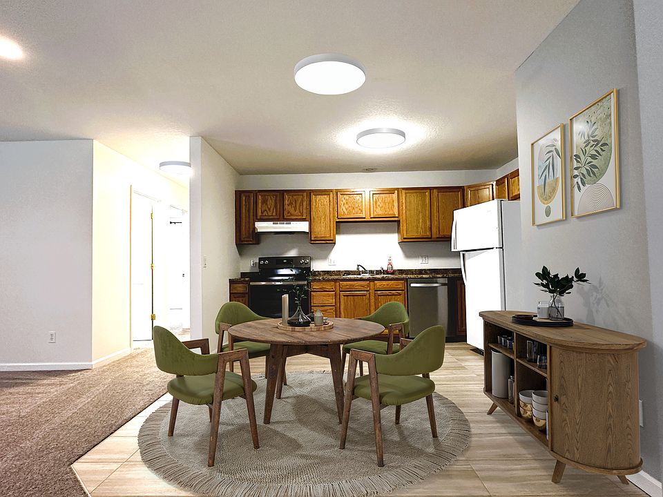 Open concept kitchen next to living room