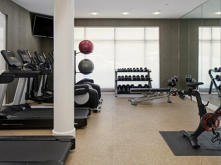 24-hour fitness center equipped with strength training and cardio equipment