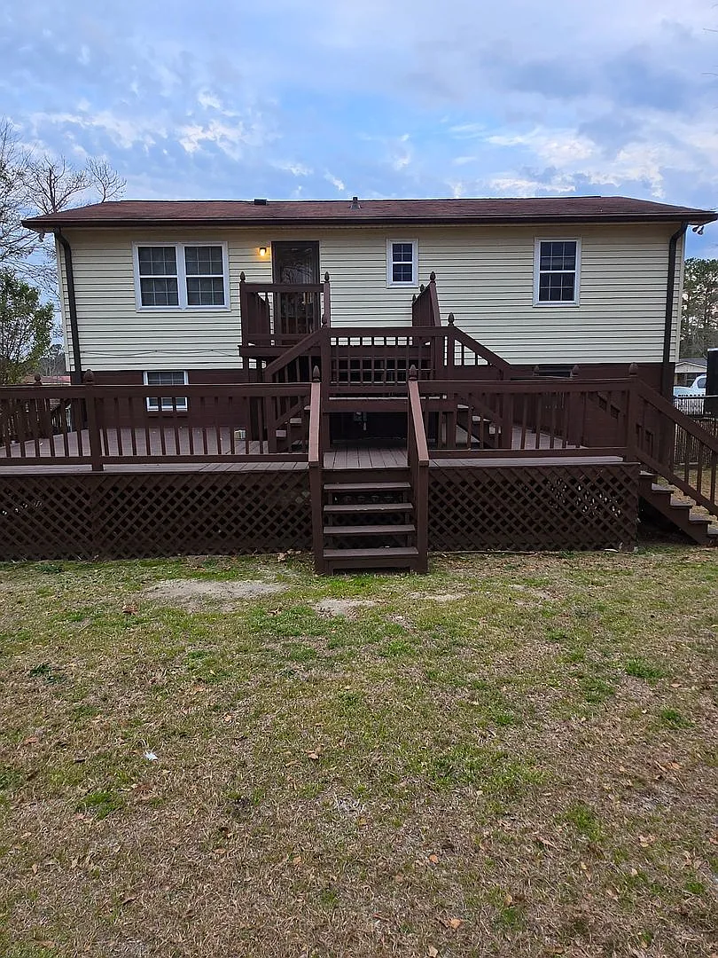 Spacious 4-Bedroom Home with Large Fenced Backyard & Two-Story Deck — Photo 3
