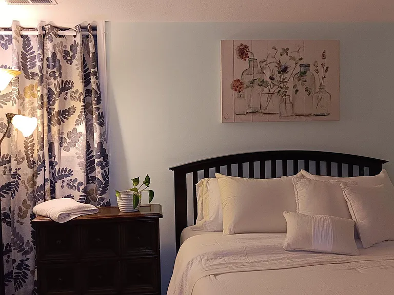 Queen, cozy bed. Black-out curtains.