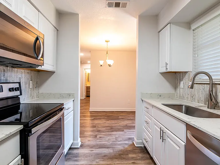 Kitchen view from one of our beautiful 2 bedroom 2 bathroom apartments!