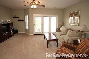 Inviting Living Room
						:
						Ceiling fan, triple atrium door that walks out to deck