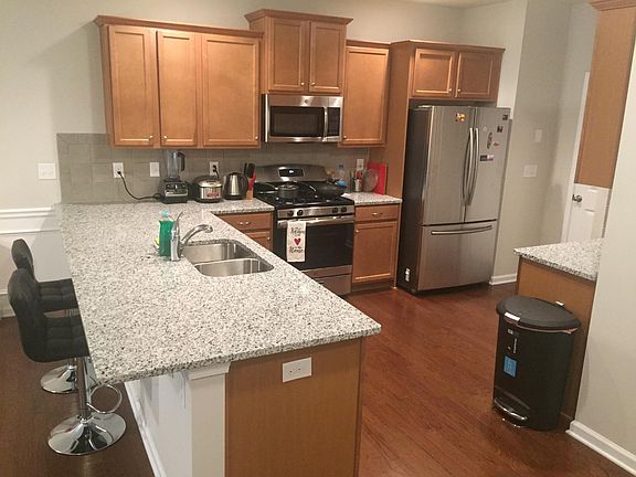 First floor kitchen (includes stove and oven range, microwave, dishwasher, french door refrigerator, garbage disposal)
