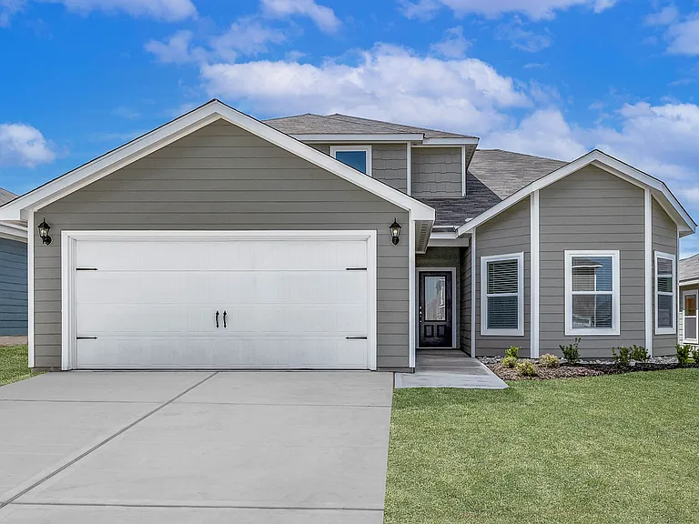 The two-story Cypress floor plan is a beautiful siding home.