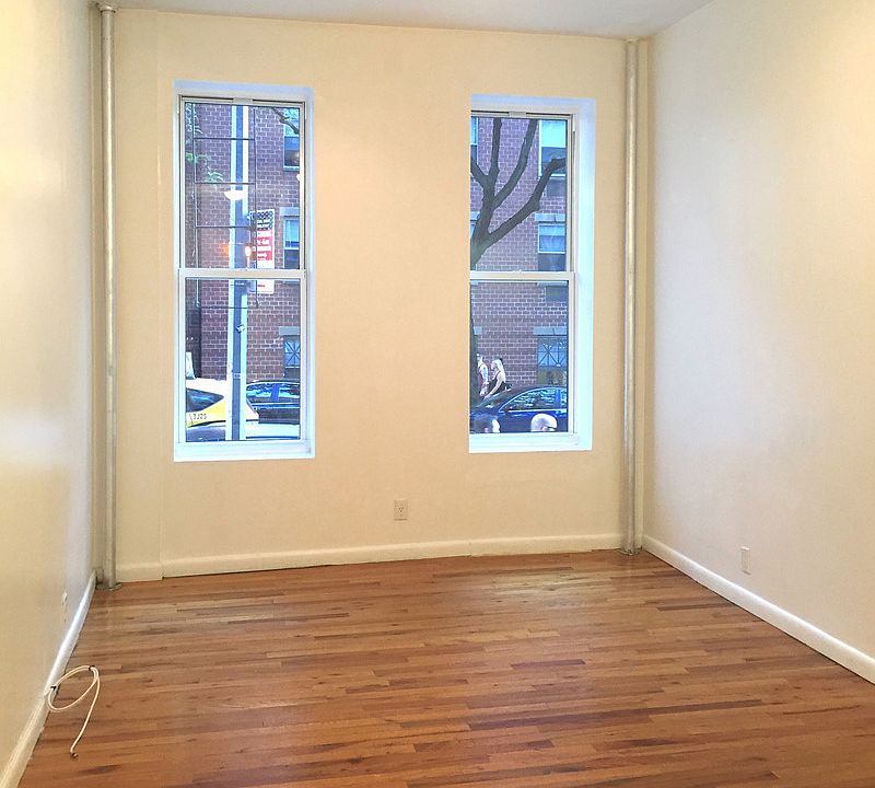 1st image of 405 W 54th St APT 1A