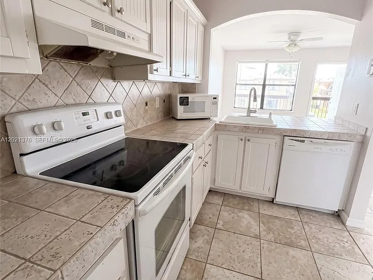 10046 Winding Lake Rd #204 — Photo 1