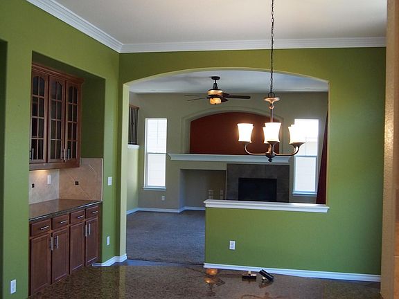 Large dining space with cabinets 