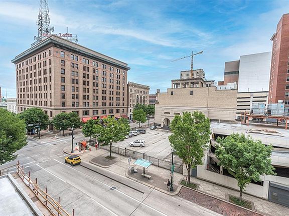 Views from Hermann Lofts #4B facing out on Travis St below. This view is to the North. Being in the Market Square Historic District there are no really tall buildings right in front of the unit, offering views of our City's architecture from the past