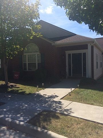 Front, beautifully landscaped