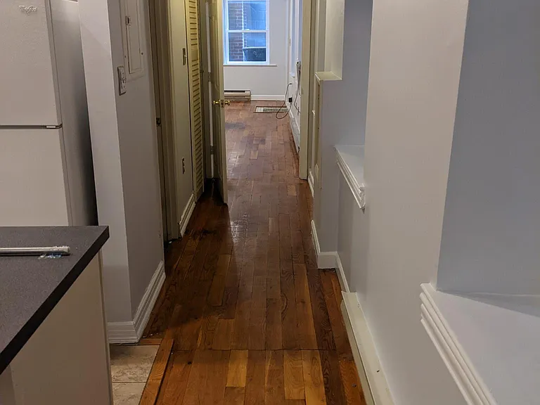 Hallway. Hardwood floors continue.