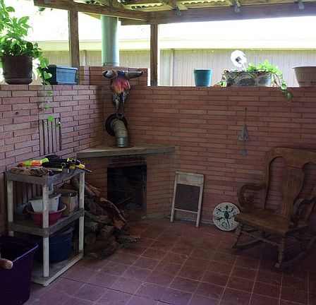 Charming outdoor brick fireplace