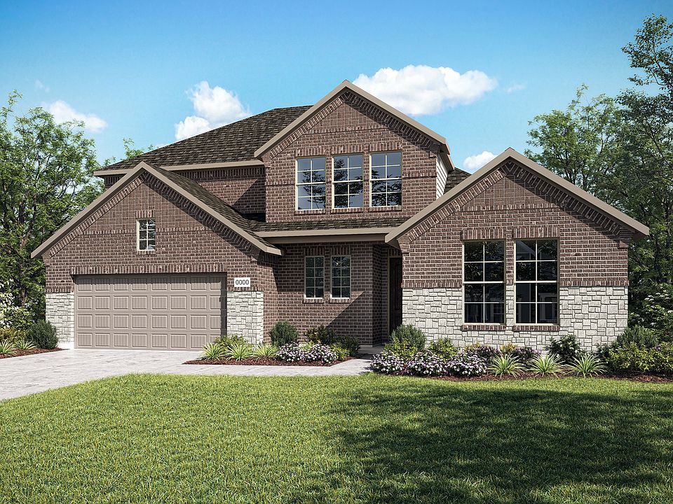 A two-story brick house with a garage, surrounded by a well-manicured lawn and lush greenery, stands