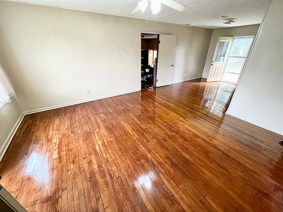 large living room with refinish wood floors