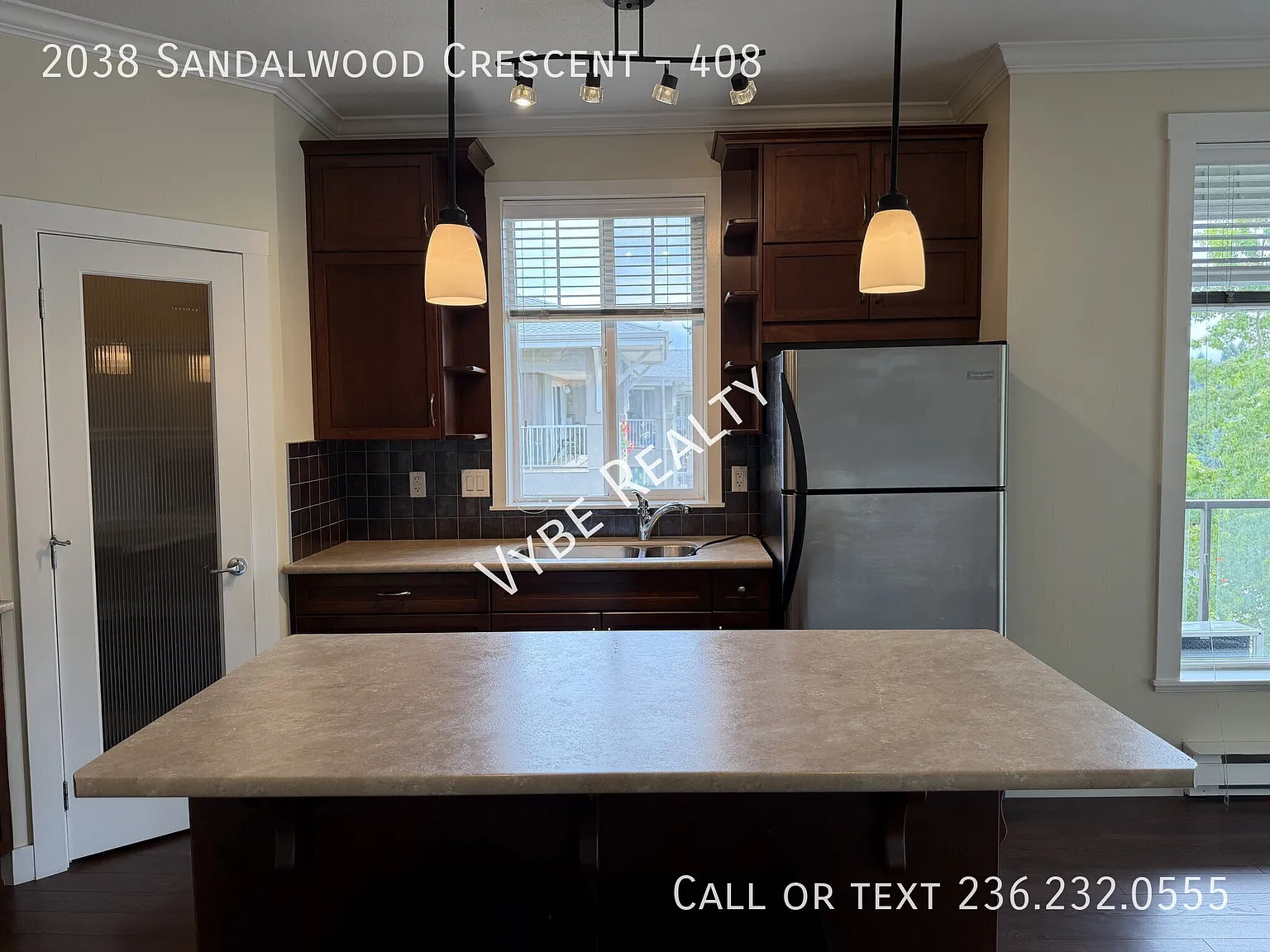 Top Floor Corner Unit — Photo 4