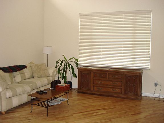 Large Living Room with hardwood floors and cathedral ceilings