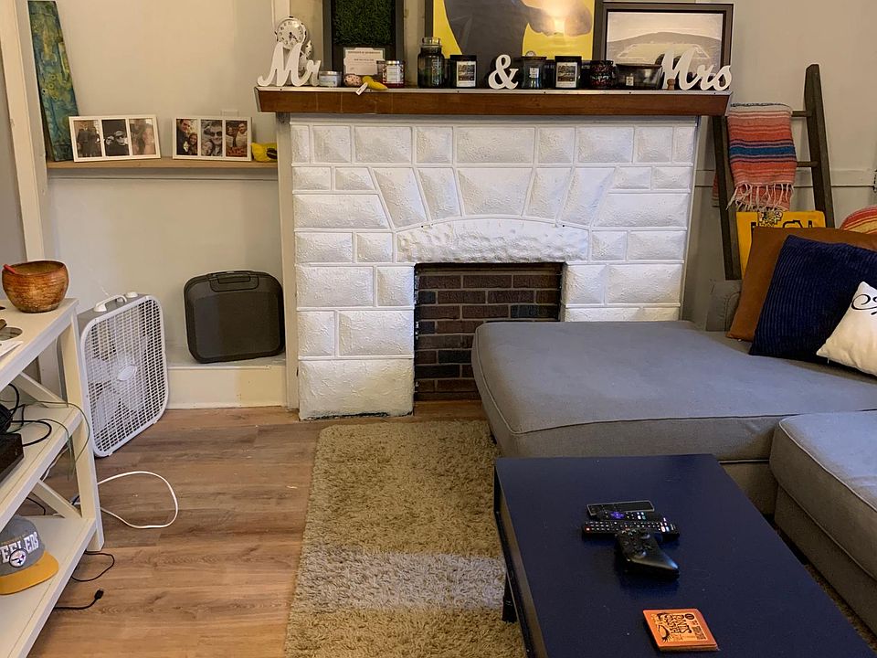 Check out that great fireplace and those built ins!