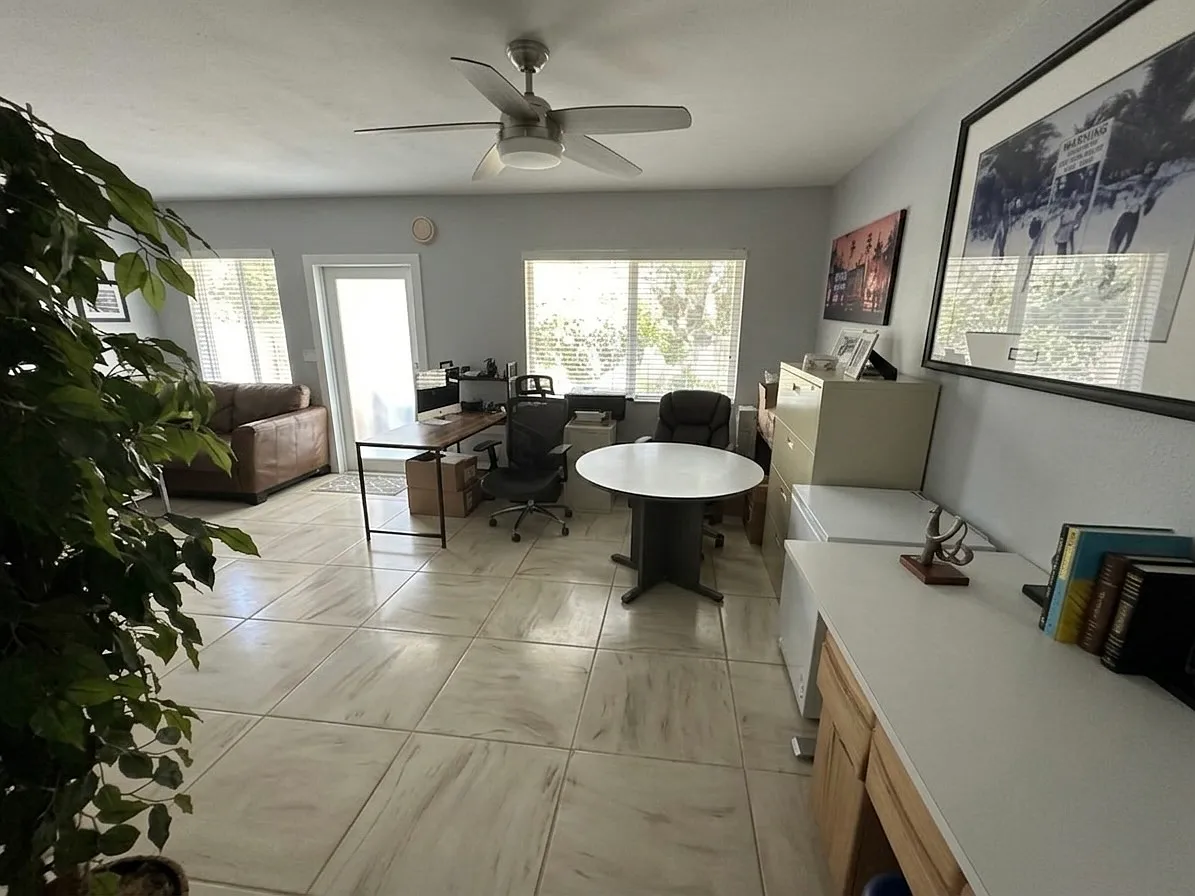 Same Living Area from Other Angle
The living space flows seamlessly _ room for a full dining set, living room, AND a home office all at once - 1101 99th St #6