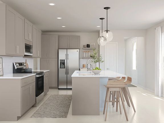 Kitchen with quartz island and countertops