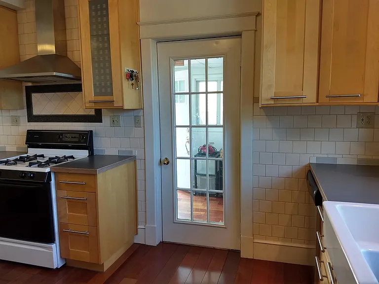 Entrance into kitchen is from a "mud room."
