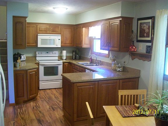 Updated Kitchen with Custom Cherry Cabinets